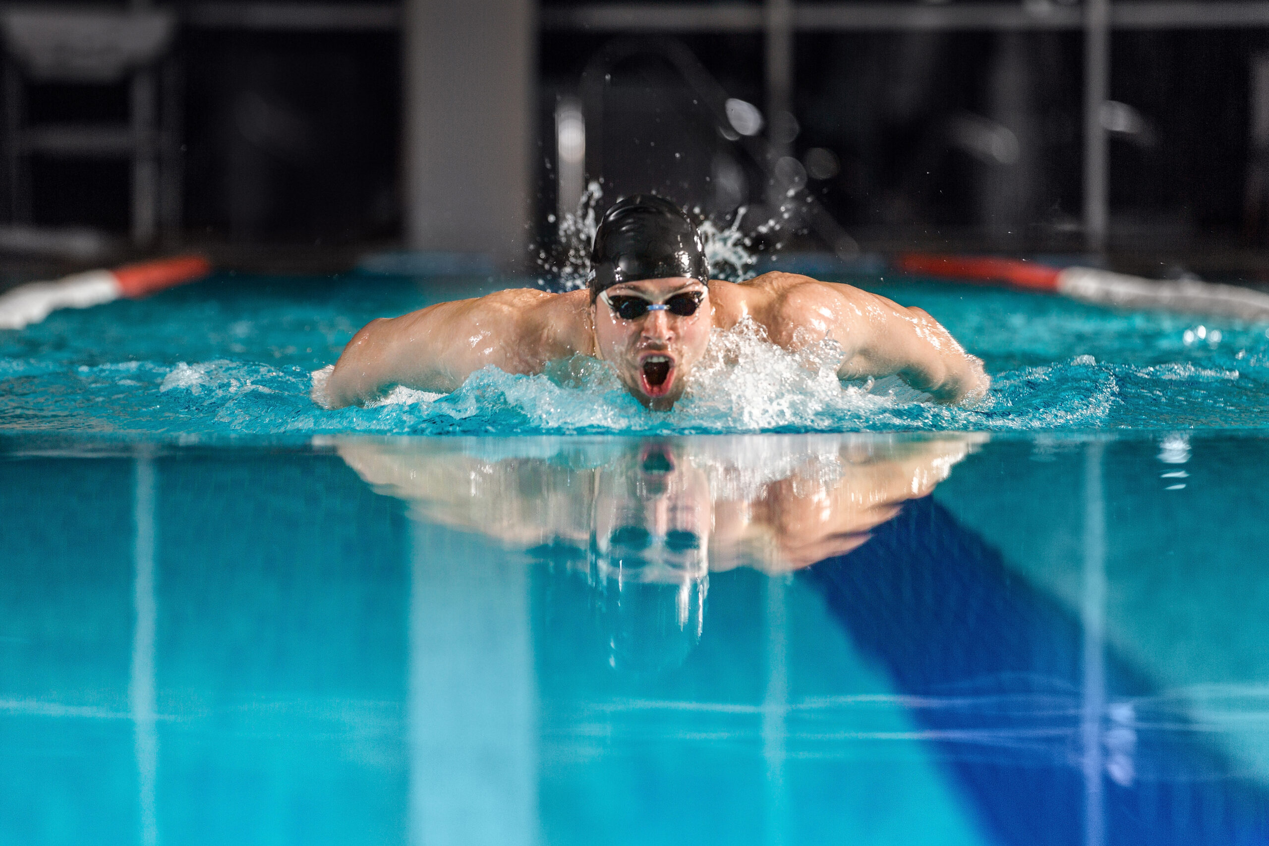 male swimmer swimming butterfly stroke scaled Abertas inscrições para 2ª Mini Maratona Aquática da AAF. Evento é gratuito e exclusivo para sócios do clube inscritos nas escolinhas de adultos